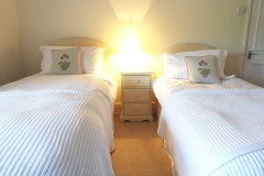 The Coach House bedroom 3 twin beds